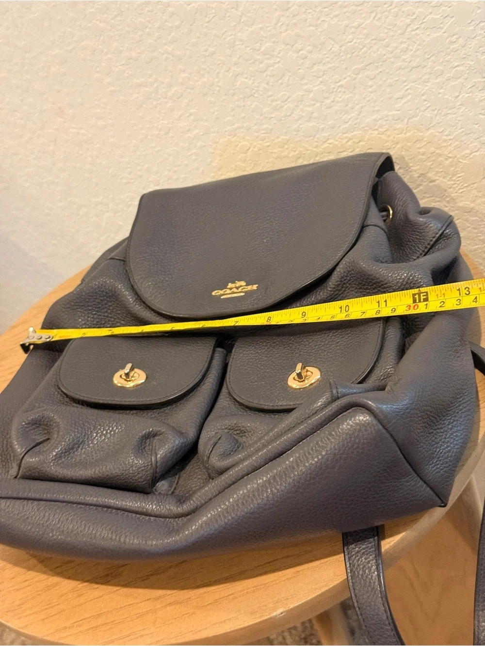 COACH Black Pebbled Leather Drawstring Backpack with Front Pockets